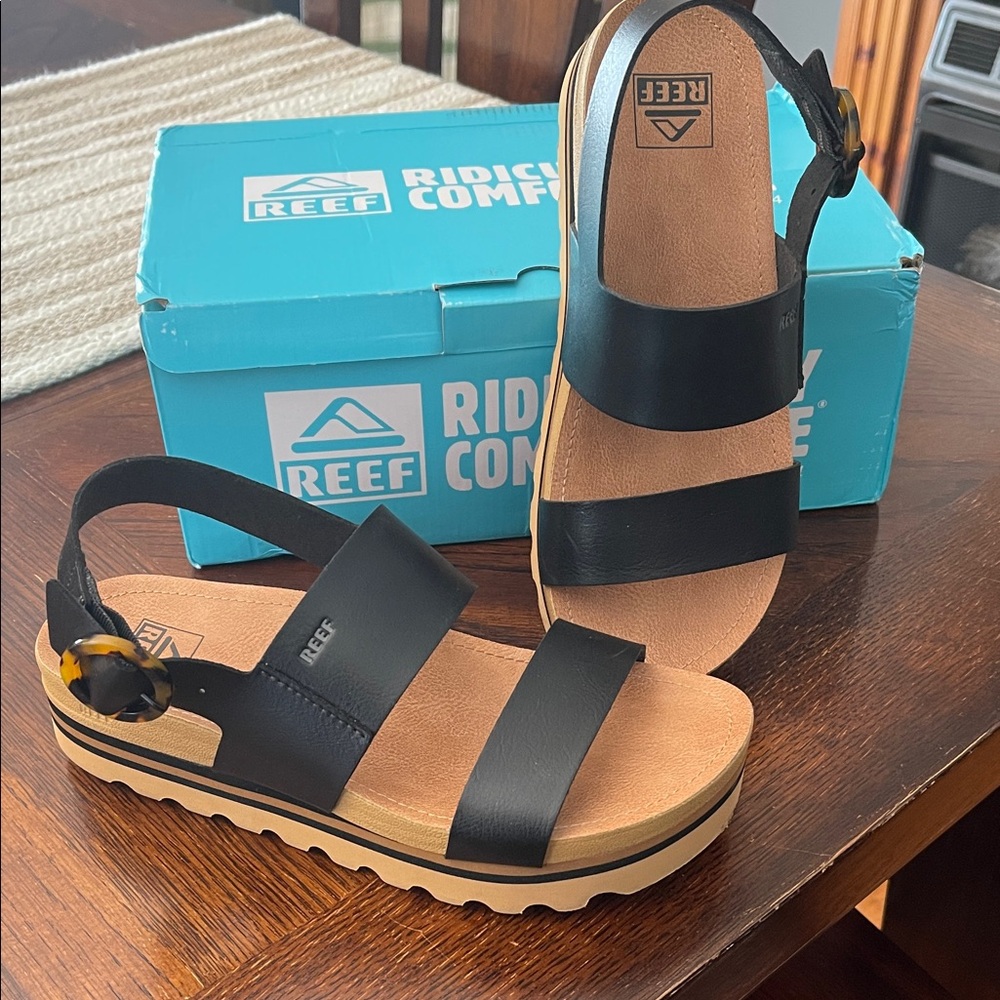 Reef Black Sandals with Brown Sole